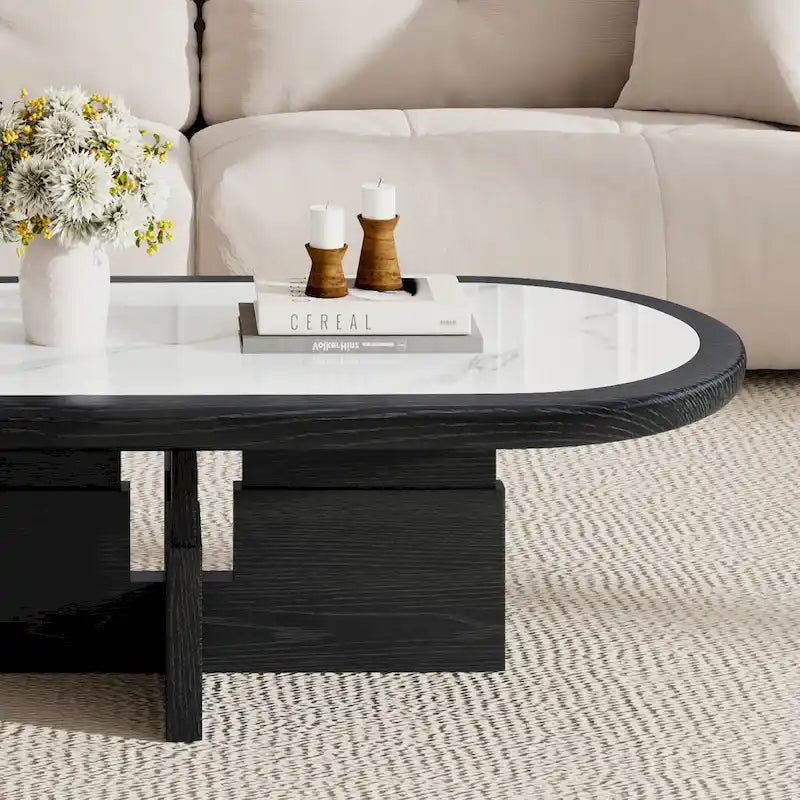 Table basse ovale noire/blanche, plateau en pierre frittée et pieds en bois, 119 cm